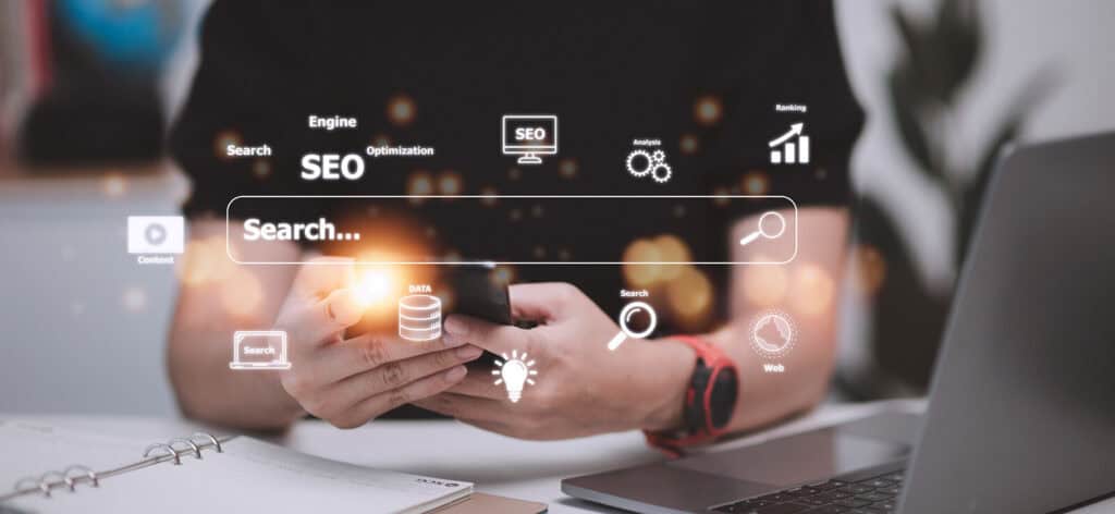 Website Marketing and SEO concept showing man using phone to search online