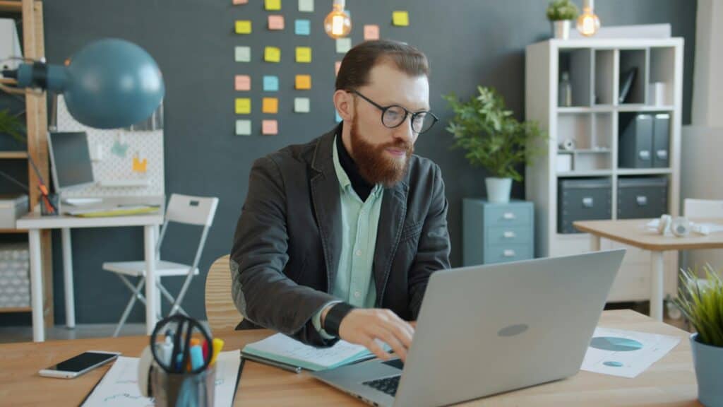 man working on laptop